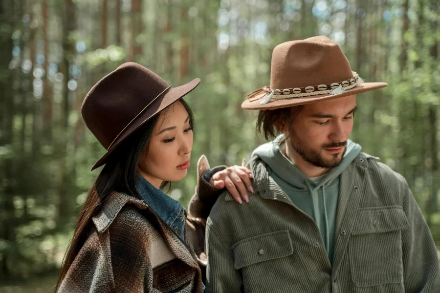 A Couple Wearing Jackets and Hats