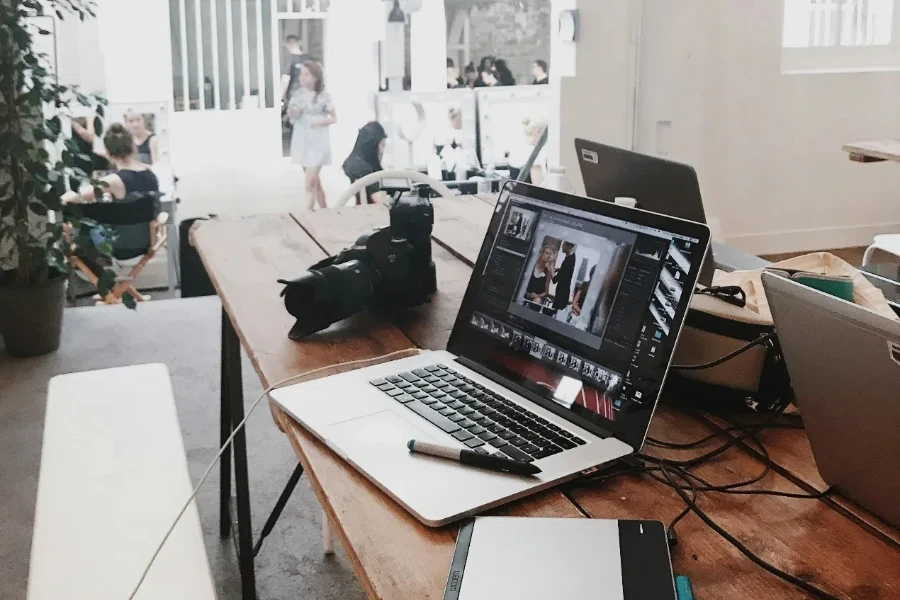 Turned-on Gray Laptop Computer on Table