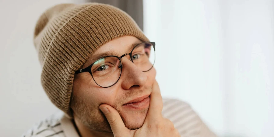 Man in a Beanie with a Hand on his Chin