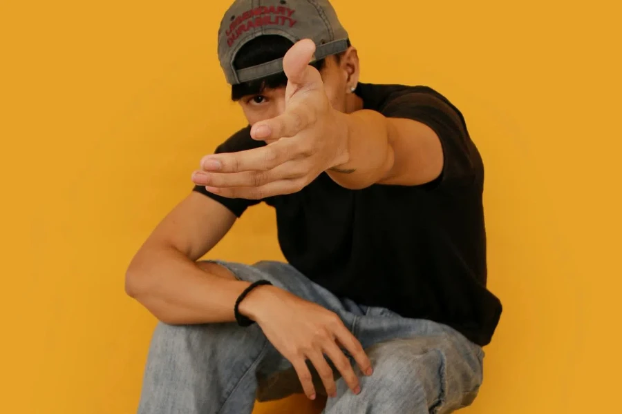 Young man in baggy jeans and a baseball cap