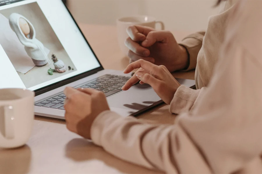 A man and woman checking a generic image