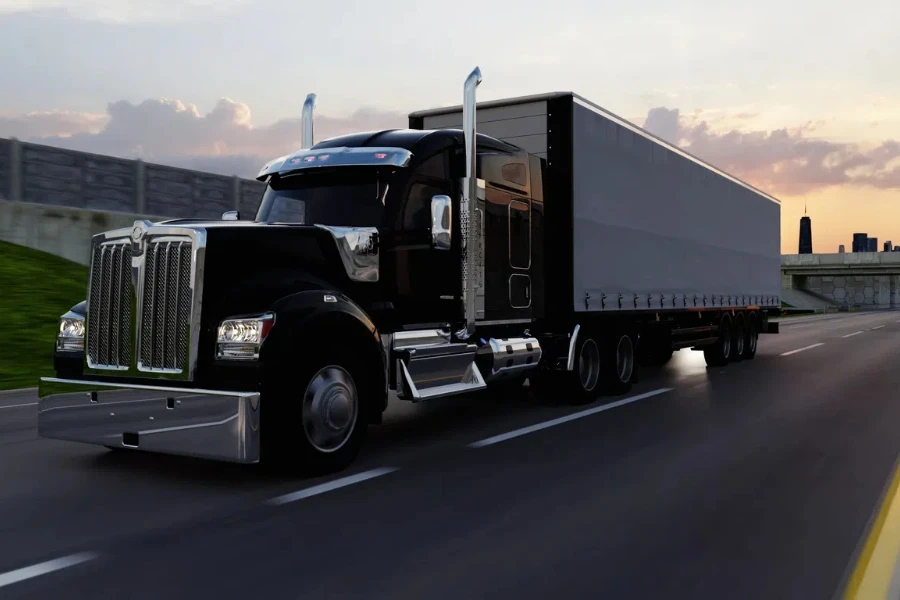 American style truck on freeway pulling load