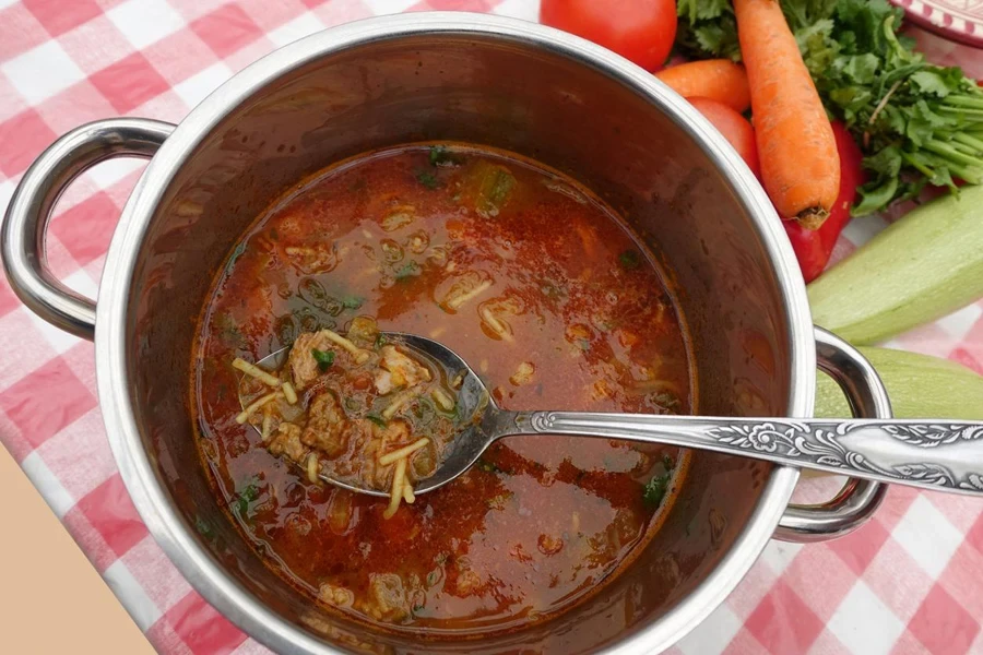 Chorba cooked in a pot Spicy soup with vegetables and lamb Middle Eastern cuisine Ramadan