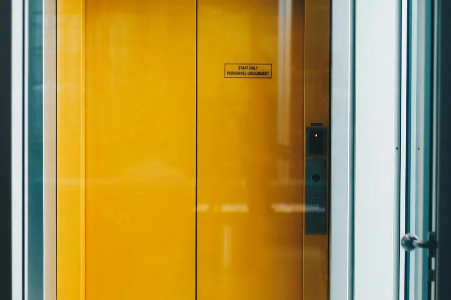 Closed Yellow Elevator Door by Martin Péchy