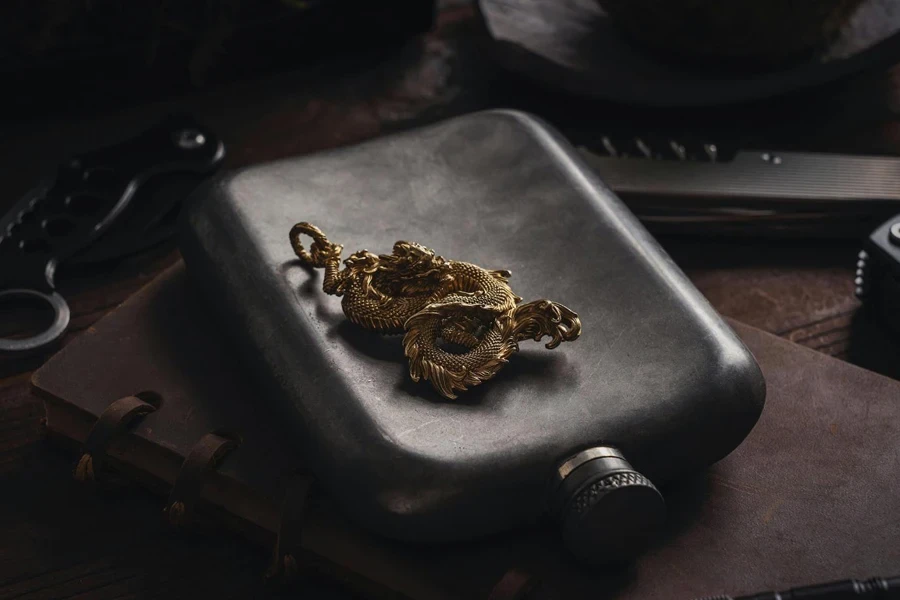 Dragon Pendant and Hip Flask