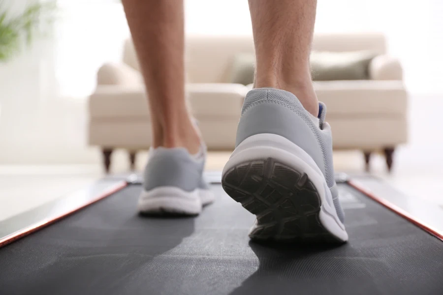 Man training on walking treadmill