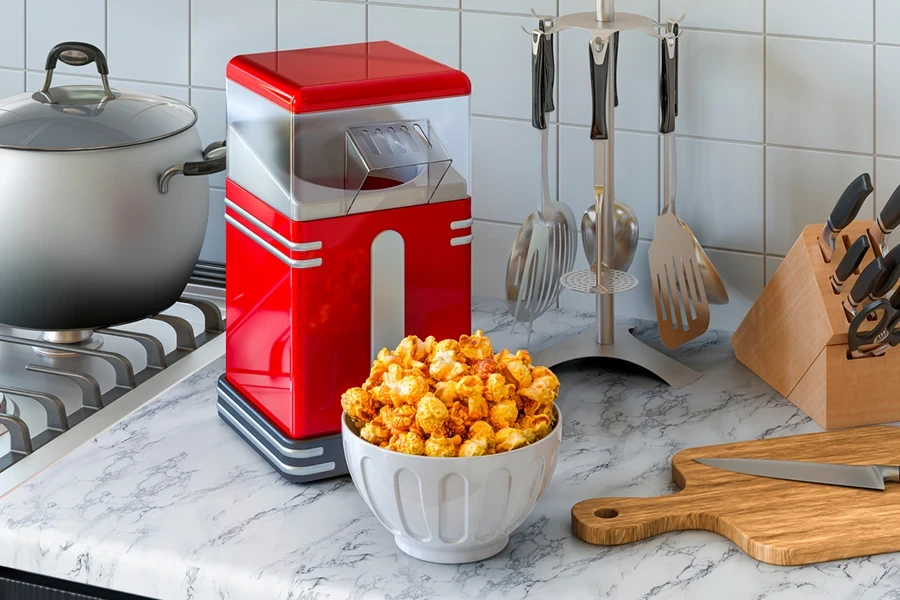 Pembuat popcorn di meja dapur