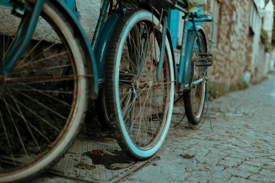 Wheels of Bikes on Street