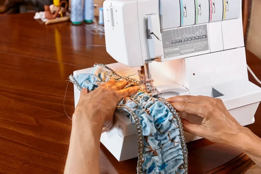 overlock sewing machine with turquoise sewing thread