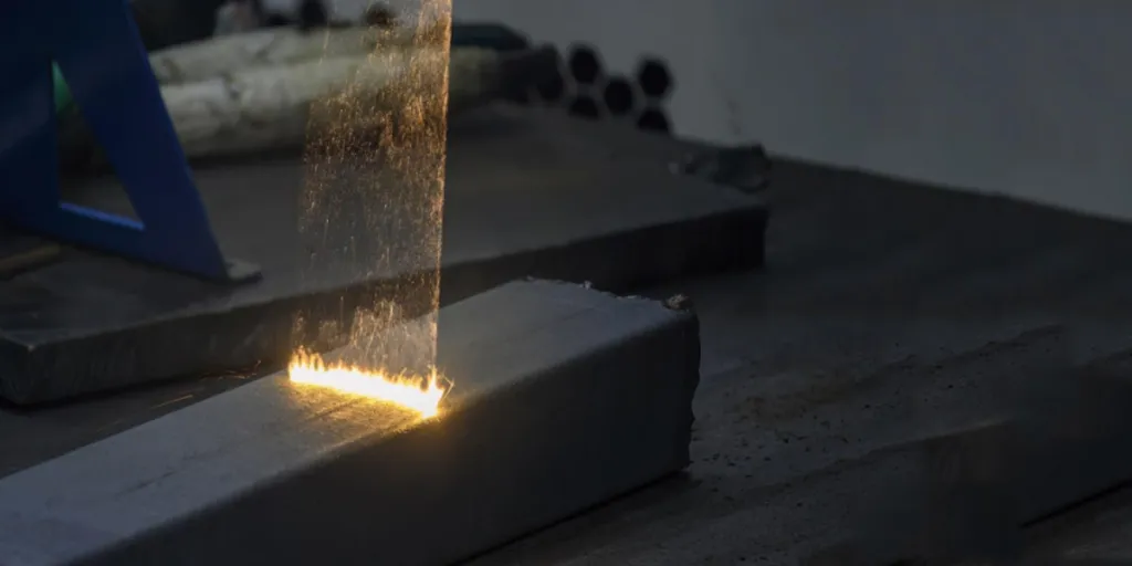 A laser cleaner removing rust from a pipe