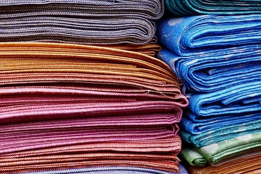 A pile of different-colored fabrics