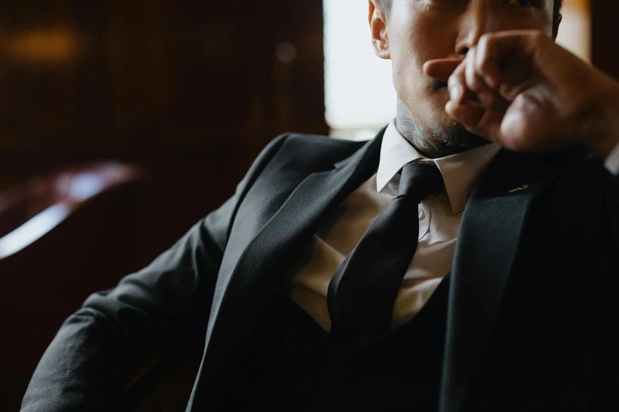 Close-up of Man in Black Suit Jacket