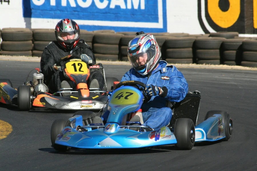 Man Driving a Fast Go Kart