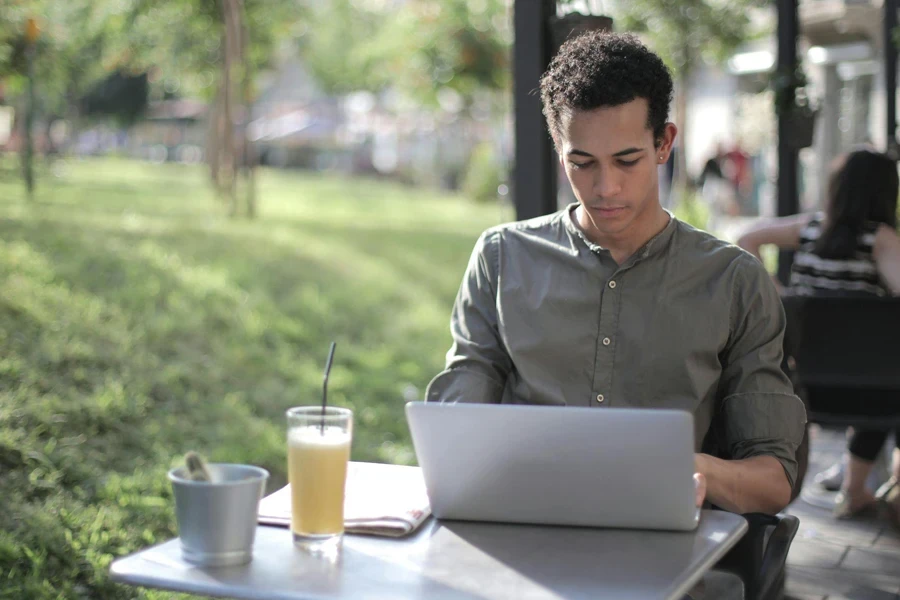 Man Working in Cafe