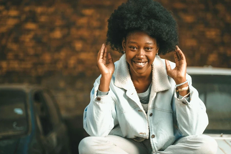 Woman with Curled Mushroom Haircut Smiling