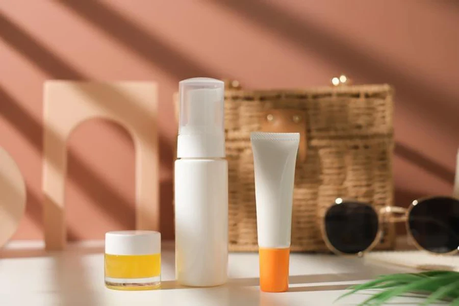 Mock up skincare and suncare packaging with bottles, tubes and jars