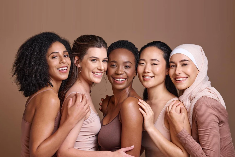 Skincare, diversity and women hug portrait for inclusivity, happiness and healthy skin texture.