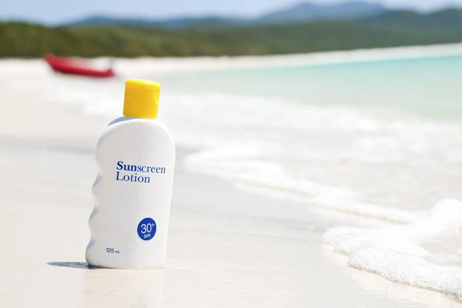 Sunscreen lotion on the beach