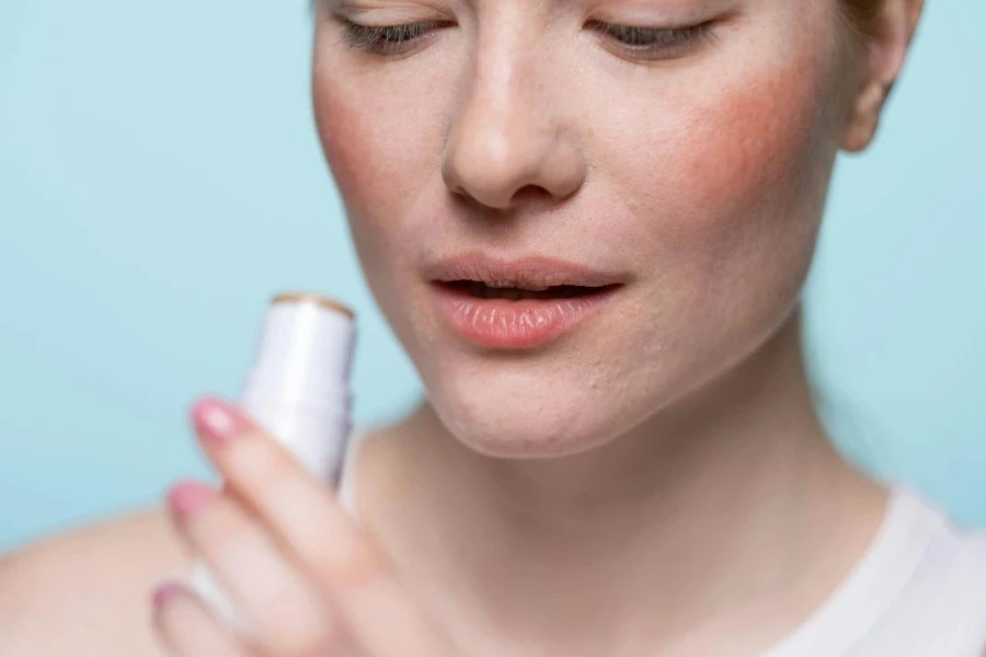 Woman Holding A Lip Balm