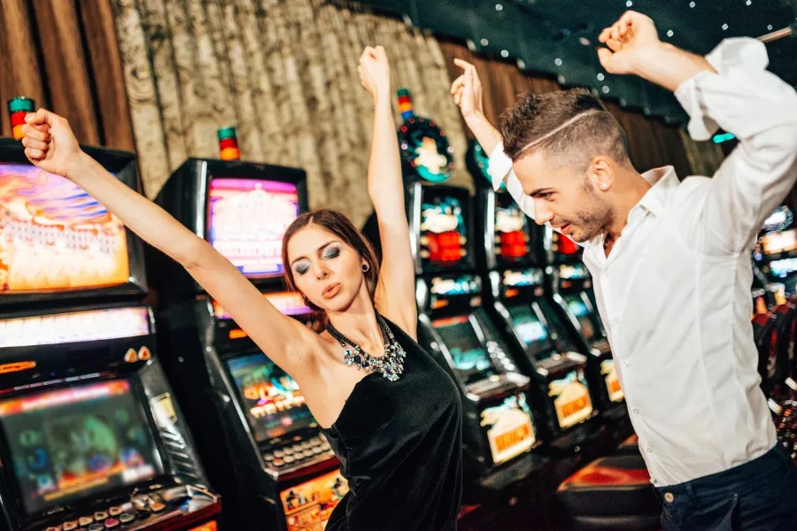 Couple dancing on a dance pad in an arcade