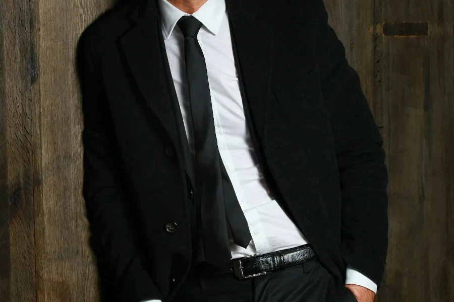 Man wearing black slim tie