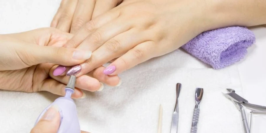 manicure removal of old gel varnish in the salon manicure master