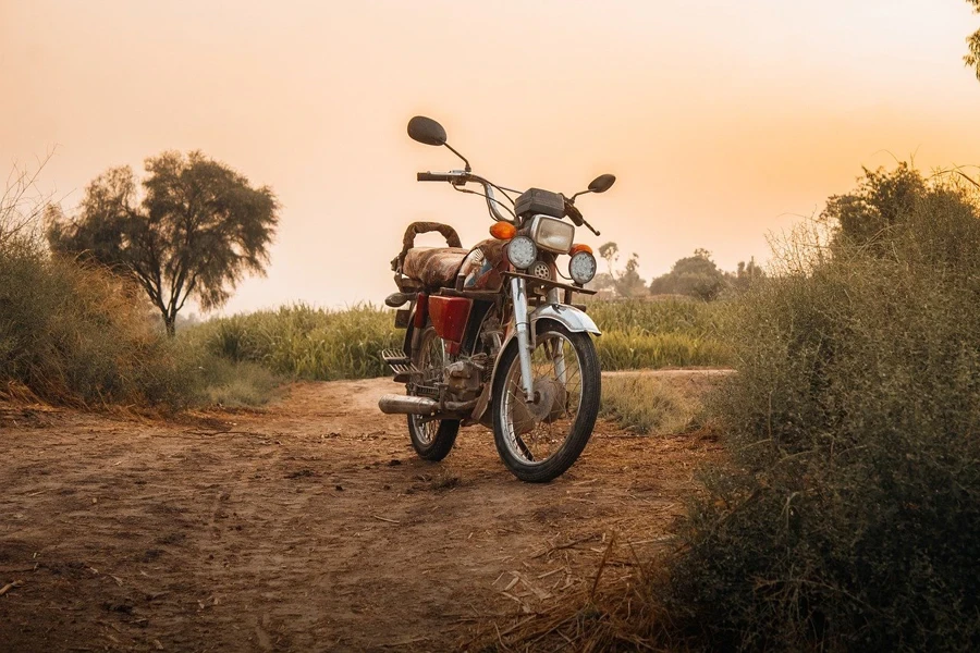 motocicleta, bicicleta, puesta de sol