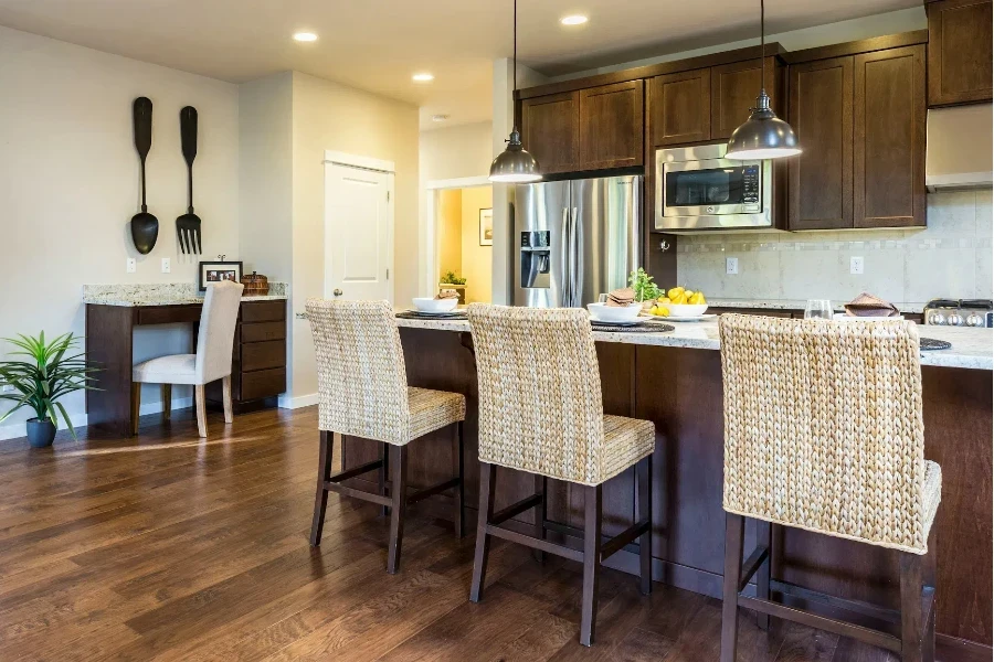 Traditional kitchen with rattan counter stools