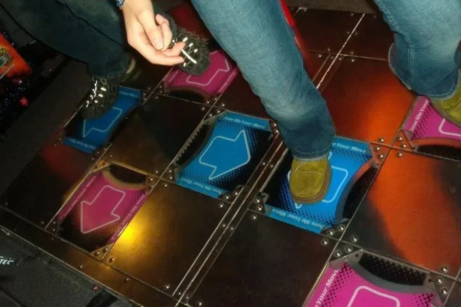 Two people dancing on a dance pad