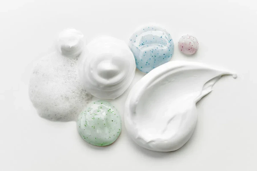 Variety of anti-aging moisturizers on a white background