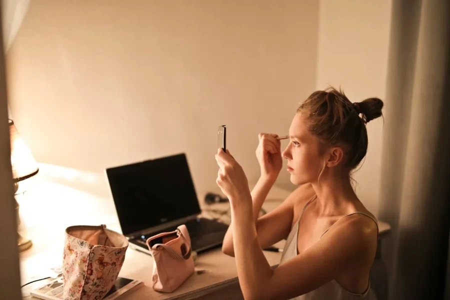 Woman applying a makeup base