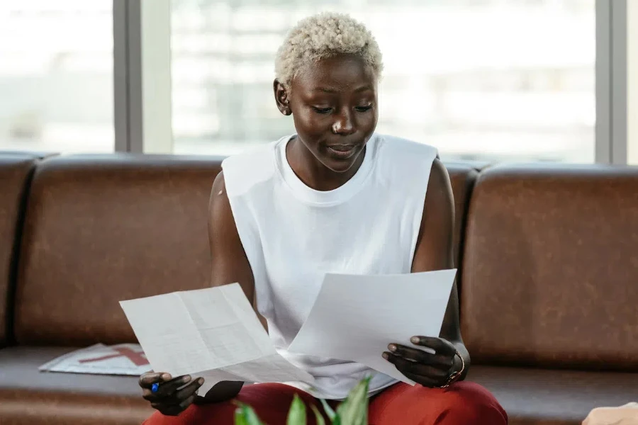 Woman comparing documents in an office