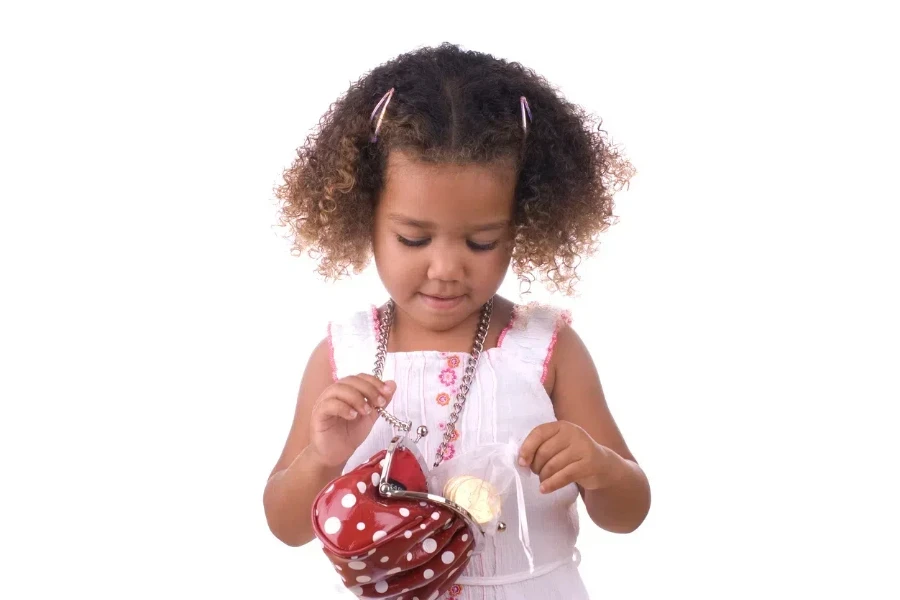 Young girl with a polka dot purse