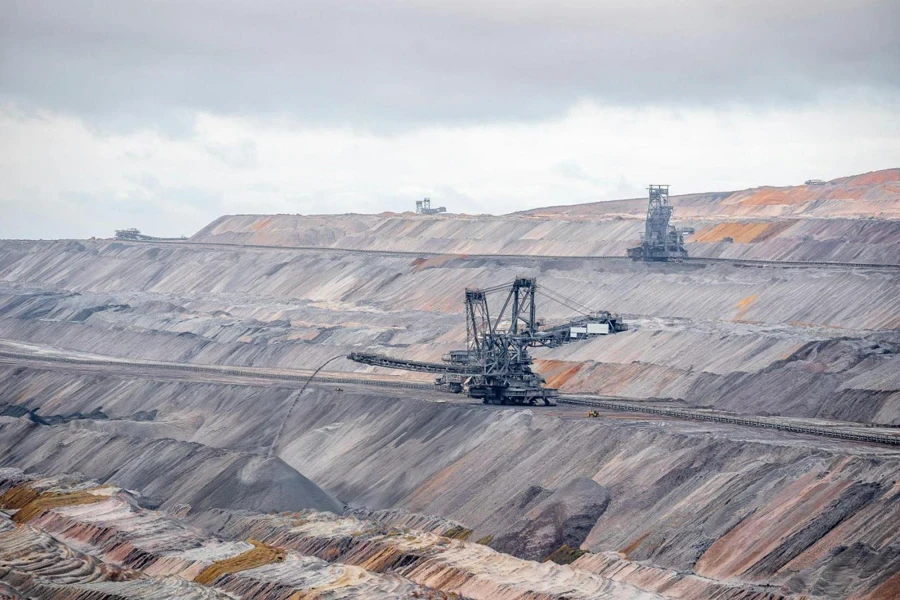 A bucket wheel excavator simultaneously digging and depositing material