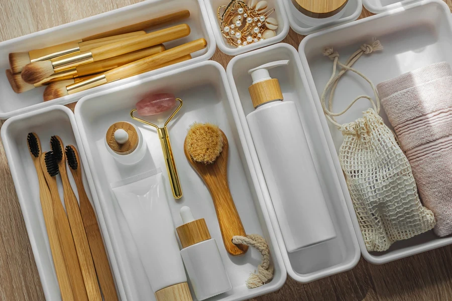 A white makeup drawer organizer with makeup