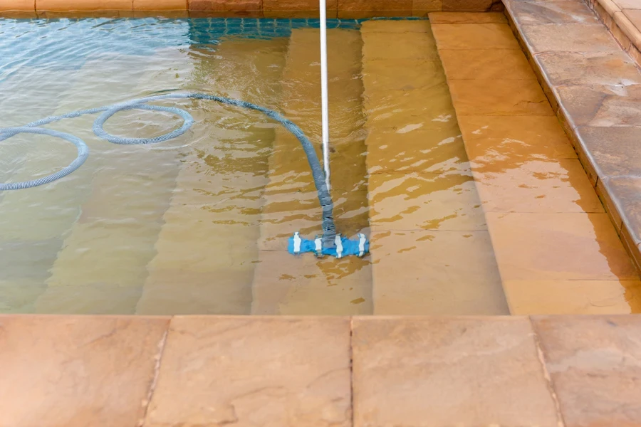 Pool vacuum cleaning pool’s steps