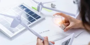 Solar energy panel and light bulb, green energy concept