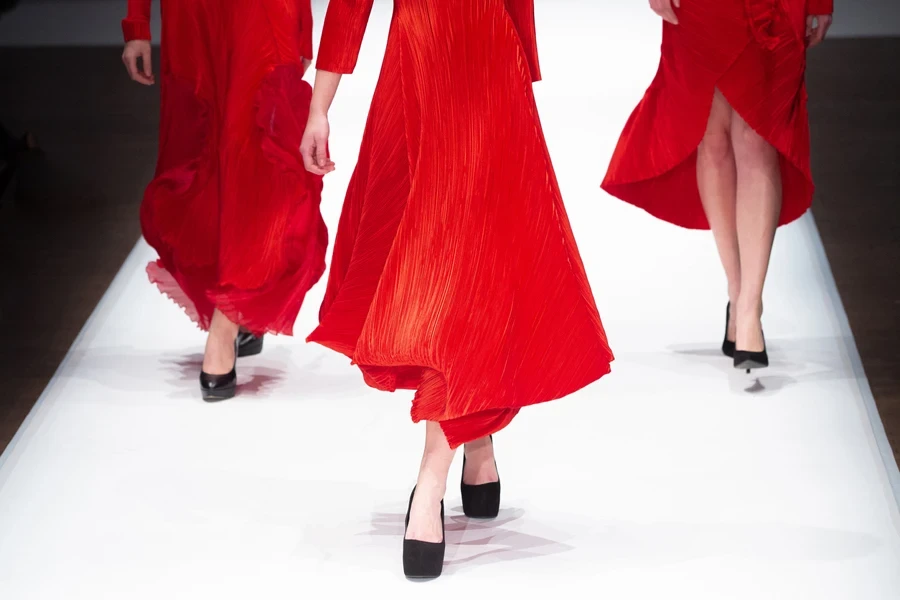 ruby red dresses on a catwalk