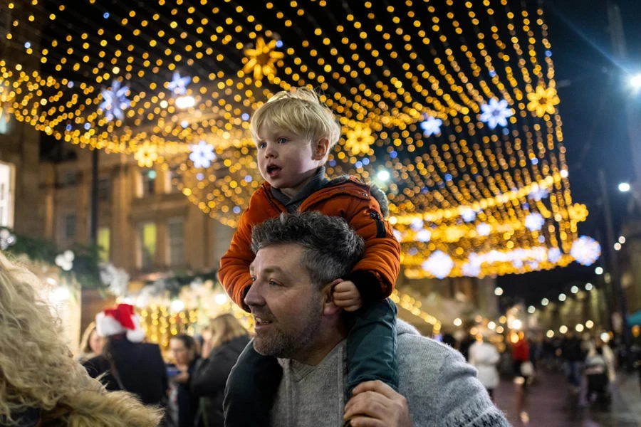 A festive display of net or curtain lights outdoors