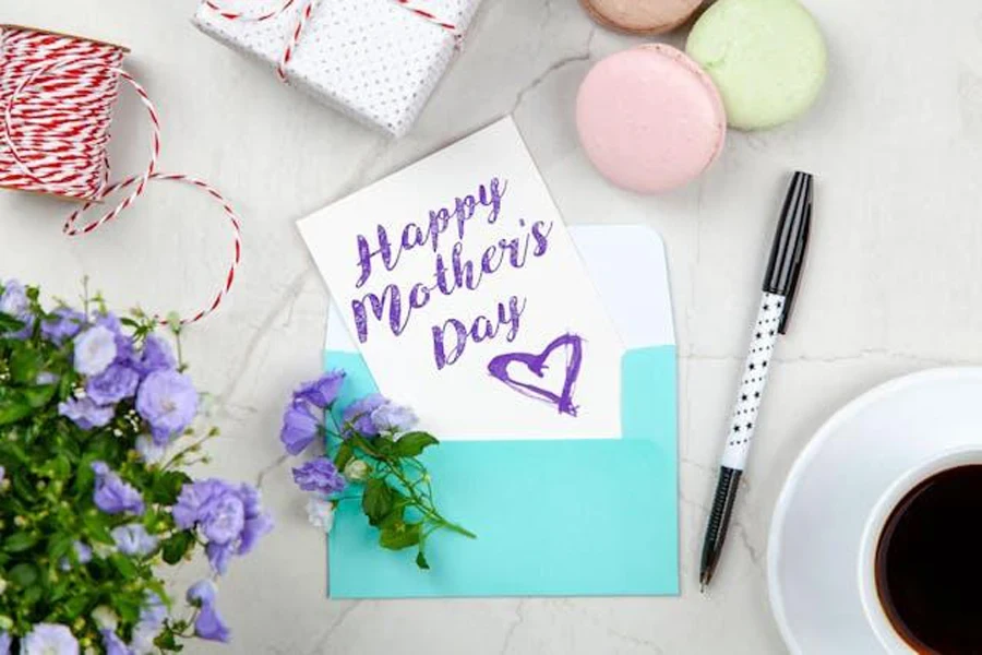 Happy Mother's Day card with a gift box and a pen