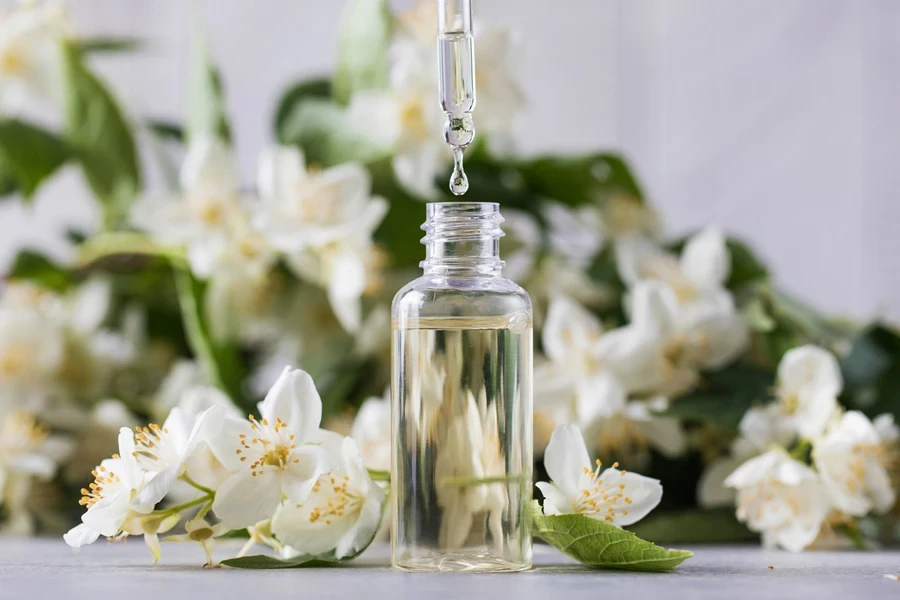 Jasmine essential oil in a glass dropper