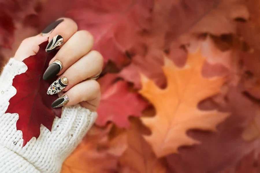 Woman with minimalist nail art in black and white