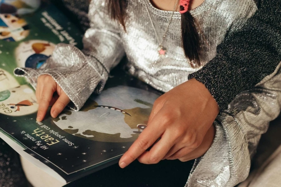 Young Girl Reading a Book