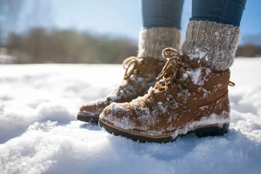 A mountaineer wearing heavy-duty winter hiking socks