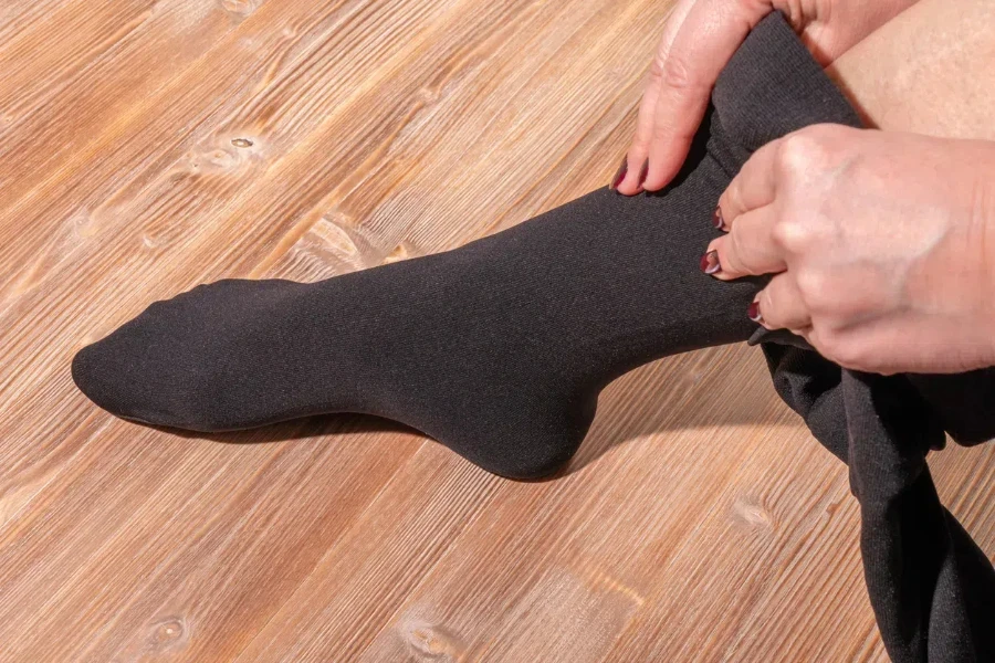 Woman wearing warm compression socks