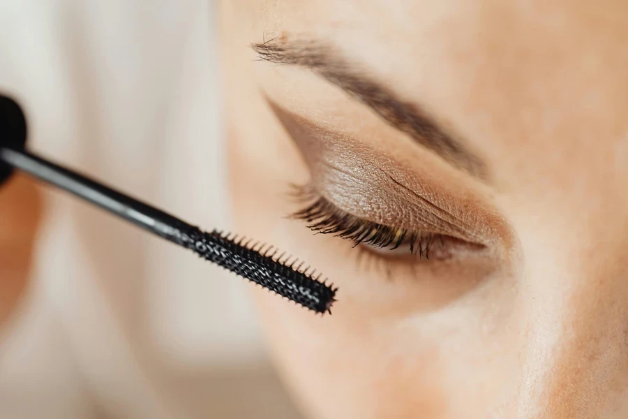 A Woman Applying Mascara