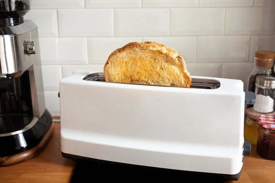 Bread in toaster on counter in kitchen