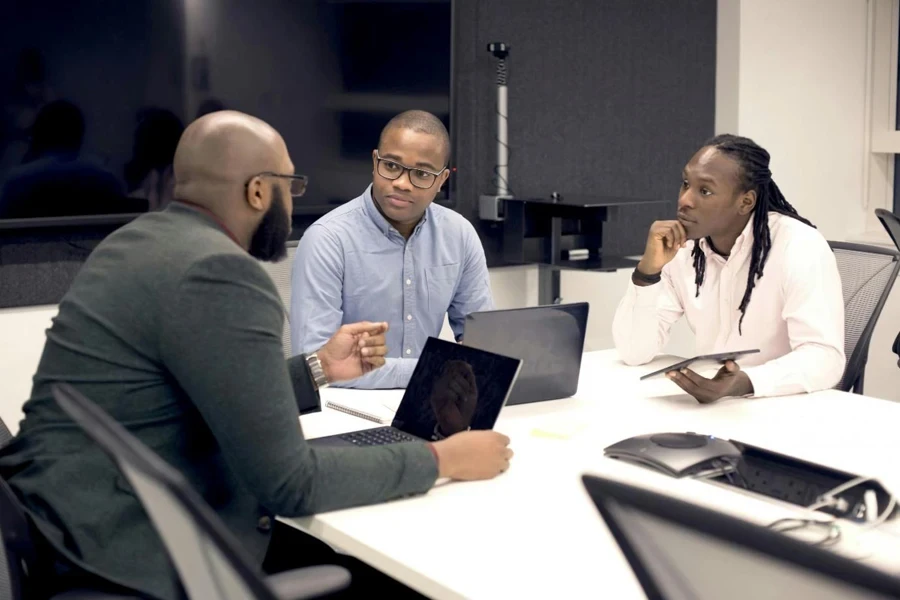 Business men having meeting in office