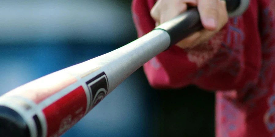 Close-up shot of a hand gripping a baseball bat