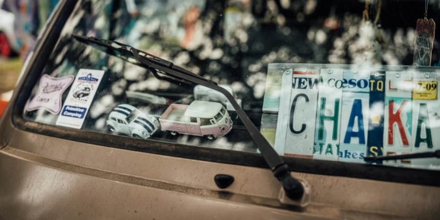 Toy Cars and Stickers on Vehicle Window